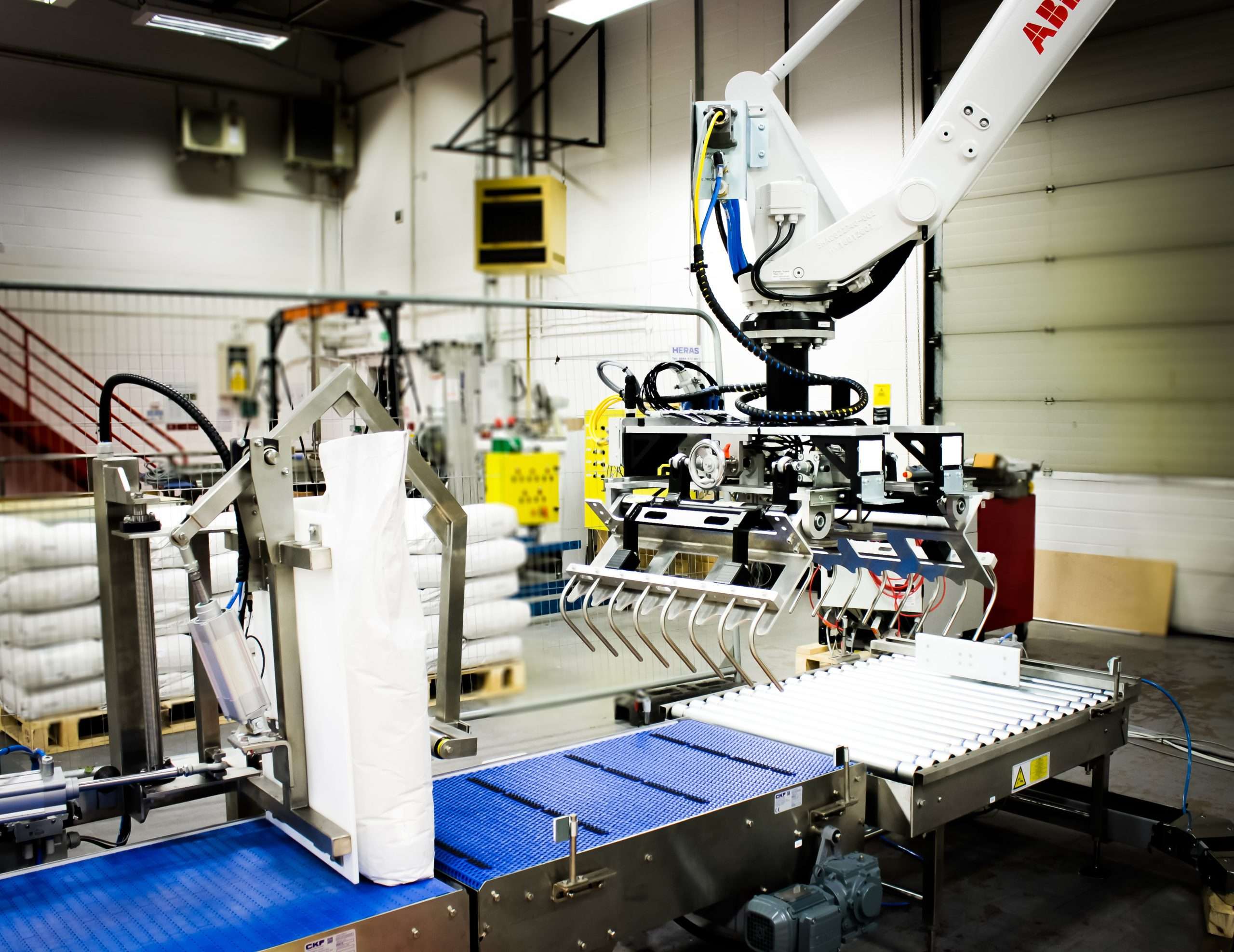 CKF design and install sack labelling and palletising solution